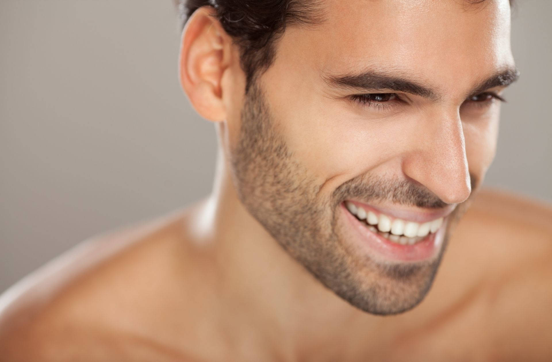 About - Man Smiling - Pure Skin Beauty